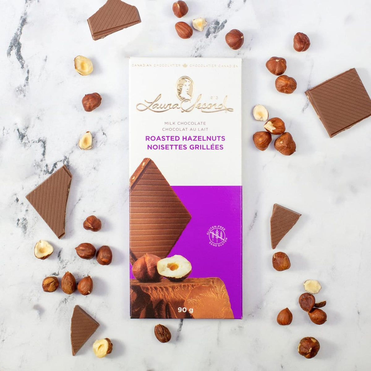 MIA Food Service LAURA SECORD ROASTED HAZELNUT CHOCOLATE BARS 12X90GR LAURA SECORD ROASTED HAZELNUT CHOCOLATE BARS 12X90GR
